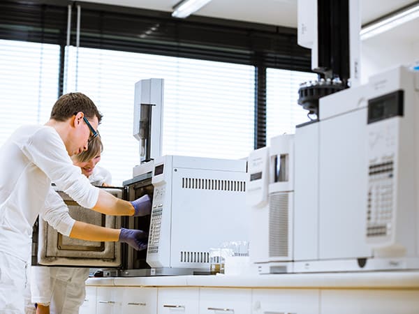 senior male researcher carrying out scientific research in a lab