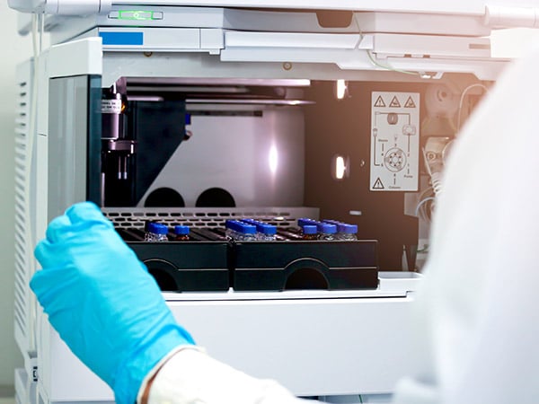 Vials (small bottle) in tray inside injection section of High Pe